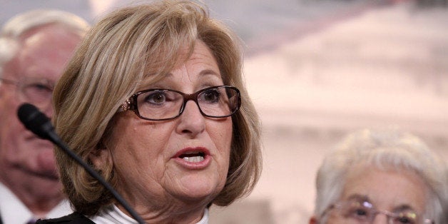 Rep. Diane Black, R-Tenn. speaks to reporters on Capitol Hill in Washington, Tuesday, March 25, 2014, after the Supreme Court heard arguments on a case involving family-owned companies that provide health insurance to their employees, but object to covering certain methods of birth control that they say can work after conception, in violation of their religious beliefs. Rep. Virginia Foxx, R-N.C. is at right. (AP Photo/Lauren Victoria Burke)