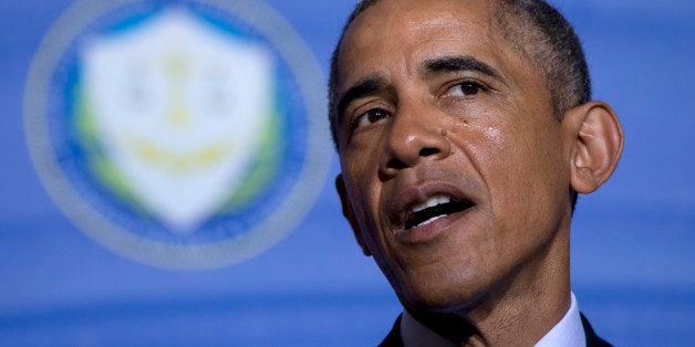 President Barack Obama speaks at the Federal Trade Commission (FTC) offices at the Constitution Center in Washington, Monday, Jan. 12, 2015, about his plan to improve confidence in technology by tackling identify theft and improving consumer and student privacy. The president wants Congress to pass legislation requiring companies to inform customers within 30 days if their data has been hacked, a move that follows high-profile breaches at retailers including Target, Home Depot and Neiman Marcus. (AP Photo/Carolyn Kaster)