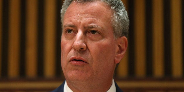 NEW YORK, NY - MAY 04: New York City Mayor Bill de Blasio speaks at police headquarters following the death of officer Brian Moore on May 4, 2015 in New York City. Officer Moore was shot in the head late Saturday during a routine stop in Queens, New York. A suspect, 35-year-old Demetrius Blackwell, has been taken into custody. The death of another New York City cop comes at a time of heightened tension between the police and many residents of America's urban environment. (Photo by Spencer Platt/Getty Images)