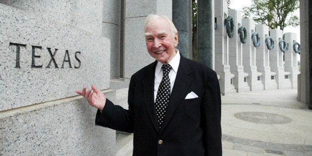 FILE - In this July 29, 2005, file photo, former House Speaker Jim Wright of Texas stands next to the Texas pillar while touring the World War II Memorial in Washington. Wright was initially denied a certificate to vote in Texas because he didnât have proper documentation under Texasâ Voter ID law, which will be enforced for the first time during Tuesdayâs election. (AP Photo/Yuri Gripas, File)