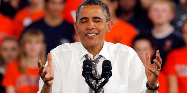 President Barack Obama shrugs during a rally in Charlottesville, Va., Wednesday, Aug. 29, 2012. ( AP Photo/Steve Helber)