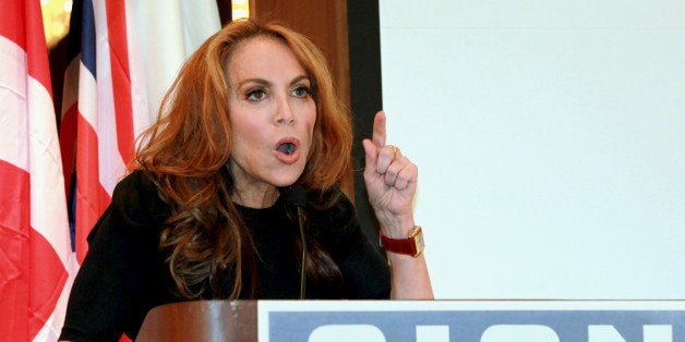 In this Sept. 11, 2012 photo, anti-Islamic blogger Pamela Geller, speaks at a conference she organized entitled; âStop Islamization of America,â in New York. An advertising campaign initiated by Gellerâs group, âThe American Freedom Defense Initiative,â will have its ads that equate foes of Israel with âsavagesâ appearing in 10 New York City subway stations after a federal judge ordered the Metropolitan Transportation Authority to put them up. (AP Photo/David Karp)