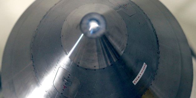 In this photo taken June 25, 2014, the warhead-containing nose cone of an inert Minuteman 3 missile is seen in a training launch tube at Minot Air Force Base, N.D. The base is tasked with maintaining 150 of the nuclear-tipped missiles spread out across the North Dakota countryside and keeping them ready to launch at a moment's notice as part of the US's nuclear defense strategy. (AP Photo/Charlie Riedel)