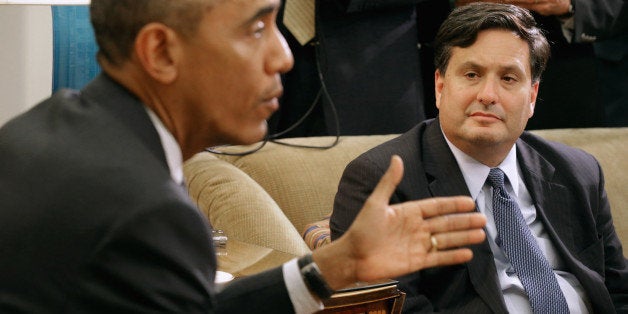 WASHINGTON, DC - OCTOBER 22: U.S. President Barack Obama (L) talks with reporters after a meeting with Ebola Response Coordinator Ron Klain in the Oval Office at the White House October 22, 2014 in Washington, DC. Obama said the federal government is working day and night to make the American people safe. (Photo by Chip Somodevilla/Getty Images)