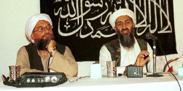 FILE - In this 1998 file photo made available Friday, March 19, 2004, Ayman al-Zawahri, left, holds a press conference with Osama bin Laden in Khost, Afghanistan. Al-Qaida's central leadership broke with one of its most powerful branch commanders, who in defiance of its orders spread his operations from Iraq to join the fighting in Syria and fueled bitter infighting among Islamic militant factions in Syrias civil war. The break, announced in a statement Monday, appeared to be an attempt by Al-Zawahri, to establish control over the feuding militant groups in Syria and stem the increasingly bloody reprisals among them. (AP Photo/Mazhar Ali Khan, File)