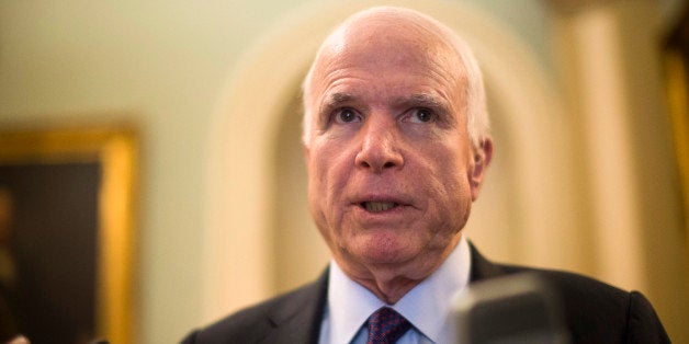 Sen. John McCain, R-Ariz. speaks to reporters on Capitol Hill in Washington, Tuesday, May 5,2015, before a GOP luncheon. (AP Photo/Brett Carlsen)