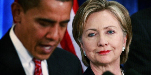 CHICAGO - DECEMBER 01: President-elect Barack Obama (L) introduces Senator Hillary Clinton (D-NY) as his choice for secretary of state during a press conference at the Hilton Hotel December 01, 2008 in Chicago, Illinois. Other members of the National Security Team named by Obama at the press conference include Washington attorney Eric Holder as attorney general, Arizona Governor Janet Napolitano as his choice for homeland security and he said Robert Gates would remain as defense secretary. Retired Marine Gen. James L. Jones was selected for the position of national security adviser and Susan Rice as U.N. ambassador. (Photo by Scott Olson/Getty Images)