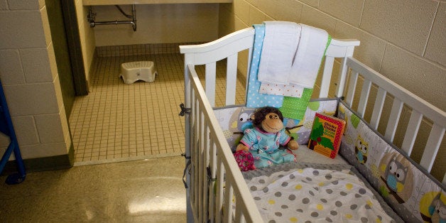 KARNES CITY, TX - JULY 31: The Karnes County Residential Center is viewed on July 31, 2014 in Karnes City, Texas. The civil facility is being used by U.S. Immigration and Customs Enforcement (ICE) to accomodate the increase of adults with children who have been apprehended illegally crossing the Southwest border. (Photo by Drew Anthony Smith/Getty Images)