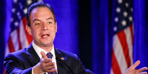 Reince Priebus, Chairman of the Republican Party, introduces Dr. Ben Watson as the luncheon speaker at the Republican Nationa