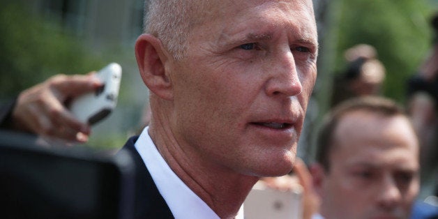 WASHINGTON, DC - MAY 06: Governor Rick Scott (R-FL) speaks to members of the media after a meeting with Secretary of Health and Human Services Sylvia Burwell May 6, 2015 in Washington, DC. Governor Scott met with Secretary Burwell to discuss his funding request for a Low Income Pool program which will be expire June 30. (Photo by Alex Wong/Getty Images)