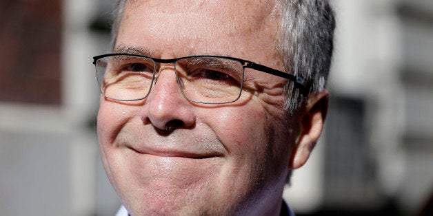 Former Florida Gov. Jeb Bush speaks to reporters as he leaves an event in New York, Thursday, April 23, 2015. (AP Photo/Seth
