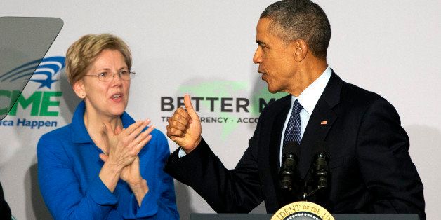 Sen. Elizabeth Warren, D-Mass. applauds as President Barack Obama makes the thumbs up sign as he arrives to speak at AARP in Washington, Monday, Feb. 23, 2015. President Barack Obama says too few Americans approaching retirement have saved enough to have peace of mind during their later years. (AP Photo/Jacquelyn Martin)