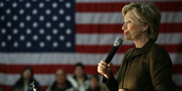 Democratic presidential hopeful, Sen. Hillary Rodham Clinton, D-N.Y., speaks at a town hall meeting at Skydiver's Hangar and Lounge at the Winterset Municipal Airport in Winterset, Iowa, Saturday, Dec. 8, 2007. (AP Photo/Kevin Sanders)