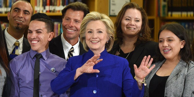 LAS VEGAS, NV - MAY 05: Democratic presidential candidate and former U.S. Secretary of State Hillary Clinton (C) poses with students and faculty after speaking at Rancho High School on May 5, 2015 in Las Vegas, Nevada. Clinton said that any immigration reform would need to include a path to 'full and equal citizenship.' (Photo by Ethan Miller/Getty Images)