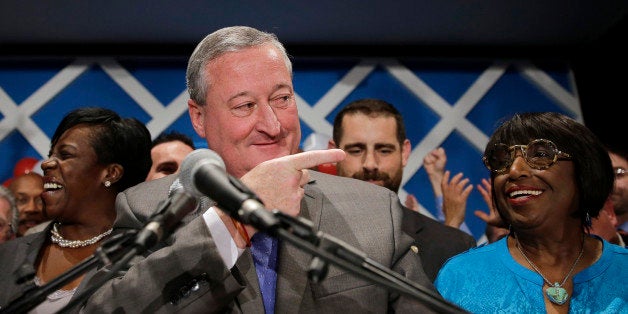 Democratic mayoral candidate and former City Councilman Jim Kenney, center, gestures onstage after winning the primary election, Tuesday, May 19, 2015, in Philadelphia. The former longtime Philadelphia councilman with broad union backing is poised to become the next mayor of the nation's fifth largest city after his resounding win Tuesday in a six-way Democratic primary. (AP Photo/Matt Slocum)