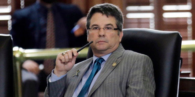 Texas Sen. Charles Perry, R- Lubbock, sits in the Senate Chambers at the Texas State Capitol, Tuesday, May 12, 2015, in Austin, Texas. A woman in Oklahoma has requested a protective order against Perry, whom she accuses of stalking and threatening to harm her. (AP Photo/Eric Gay)