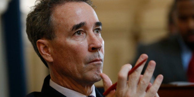 In this Tuesday, Jan. 20, 2015 photo, Del. Joe Morrissey, D-Henrico, watches the proceedings during the House of Delegates session at the Capitol in Richmond, Va. Morrissey, elected while jailed for a sex scandal, say voters rewarded him for his responsiveness to their concerns and ability to relate to their legal and economic struggles. (AP Photo/Steve Helber)