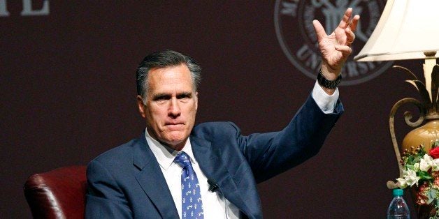 Former GOP presidential candidate Mitt Romney answers questions during a question-and-answer period following his address to the student body and guests in Starkville, Miss., Wednesday, Jan. 28, 2015. Romney joked about his time as a candidate and addressed a number of world issues including terrorism, world economy and domestically "the need for strong American leadership," and job creation for Americans. (AP Photo/Rogelio V. Solis)