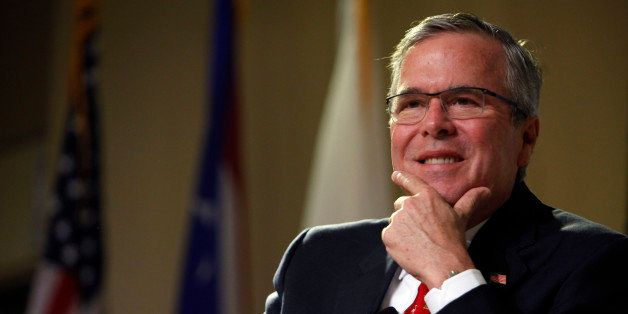 Former Florida Gov. Jeb Bush attends an event at the Metropolitan University in San Juan, Puerto Rico, Tuesday, April 28, 2015. The former Florida governor delivered a speech on economic opportunities partly in Spanish on Tuesday, and his audience responded with hearty applause. Bush is fluent in the language, and often uses it in Florida, but it's rarely heard in Republican presidential campaign politics. (AP Photo/Ricardo Arduengo)