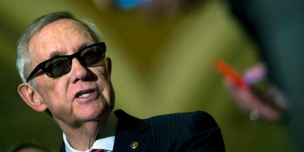 WASHINGTON, DC - APRIL 28:Senate Minority Leader Harry Reid (D-NV) speaks during a news conference after a policy meeting with Senate Democrats, on Capitol Hill, April 28, 2015 in Washington, DC. The Senate began debate on Tuesday on legislation granting Congress the ability to review and possibly reject any nuclear deal the United States makes with Iran. (Photo by Drew Angerer/Getty Images)