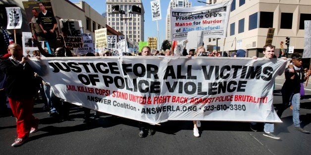 Protestors calling for the end of police brutality marched through downtown Sacramento, Calif., Tuesday,...