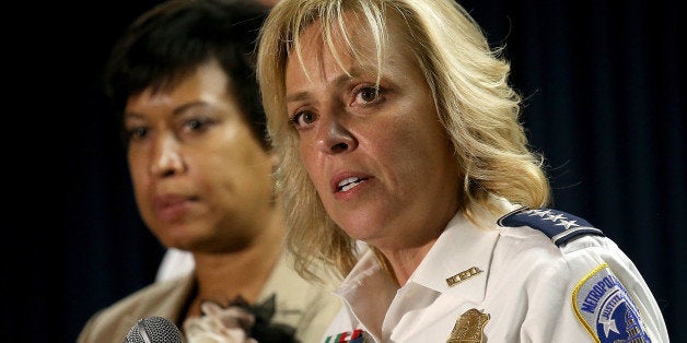 WASHINGTON, DC - MAY 21: Mayor Muriel Bowser (L) of Washington, DC listens as Chief of the Metropolitan Police Department Cathy Lanier (R) speaks at a press conference at police headquarters May 21, 2015 in Washington, DC. Bowser and Lanier asked the public for help in locating a suspect, Daron Dylon Wint, in a quadruple murder in the killing of Savvas Savopoulos and his family. Authorities believe Wint may have traveled to the Brooklyn, New York area. (Photo by Win McNamee/Getty Images)