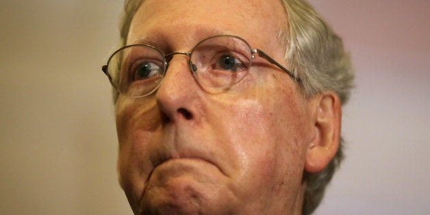 WASHINGTON, DC - MAY 12: U.S. Senate Majority Leader Sen. Mitch McConnell (R-KY) pauses as he speaks to members of the media after the weekly Senate Republican Policy Luncheon May 12, 2015 on Capitol Hill in Washington, DC. The Republicans held the weekly luncheon to discuss GOP agenda. (Photo by Alex Wong/Getty Images)