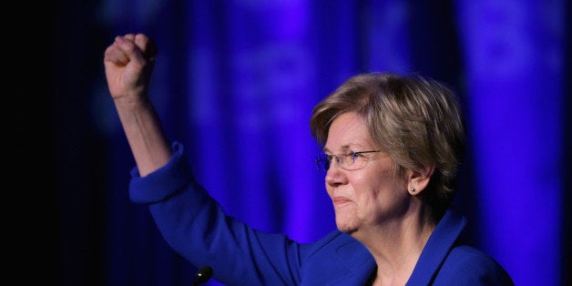 WASHINGTON, DC - APRIL 13: Sen. Elizabeth Warren (D-MA) delivers remarks during the Good Jobs Green Jobs National Conference at the Washington Hilton April 13, 2015 in Washington, DC. Sponsored by a varied coalition including lightweight metals producer Alcoa, the United Steelworks union, the Sierra Club and various other labor, industry and telecommunications leaders, the conference promotes the use of efficient and renewable energy and cooperation in updating the country's energy infrastructure. (Photo by Chip Somodevilla/Getty Images)