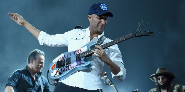 LOS ANGELES, CA - FEBRUARY 06: Guitarist Tom Morello performs onstage at the 25th anniversary MusiCares 2015 Person Of The Year Gala honoring Bob Dylan at the Los Angeles Convention Center on February 6, 2015 in Los Angeles, California. The annual benefit raises critical funds for MusiCares' Emergency Financial Assistance and Addiction Recovery programs. For more information visit musicares.org. (Photo by Larry Busacca/Getty Images for NARAS)