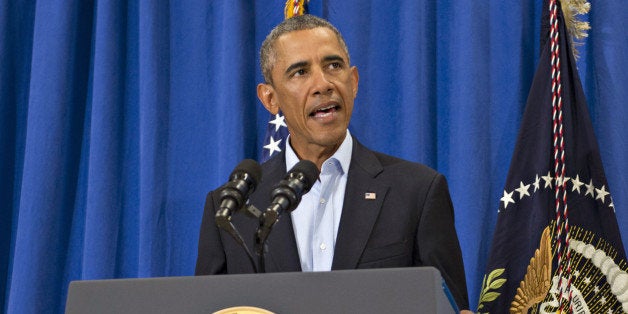 EDGARTOWN, MA - AUGUST 20: (AFP OUT) U.S. President Barack Obama makes a statement about the execution of American journalist James Foley by ISIS terrorists in Iraq during a press briefing at the press filing center at the Edgartown School August 20, 2014 in Edgartown, Martha's Vineyard, Massachusetts. A video released shows an ISIS militant beheading Foley in what is believed to be retaliation for U.S. airstrikes in Iraq. The militant then threatens the life of another American hostage, Steven Sotloff, who is also missing. (Photo by Rick Friedman-Pool/Getty Images)