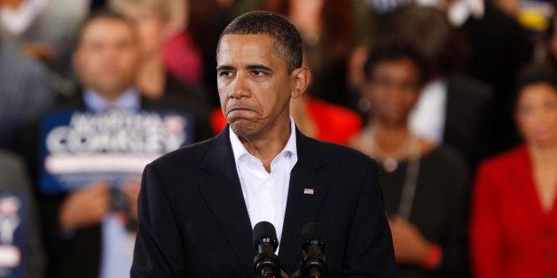 President Barack Obama frowns while speaking at a campaign rally for Mass. Attorney General Martha Coakley, the Democratic candidate vying for the seat vacated by the death of U.S. Sen. Edward Kennedy, D-Mass., Sunday, Jan. 17, 2010, in Boston. (AP Photo/Michael Dwyer)