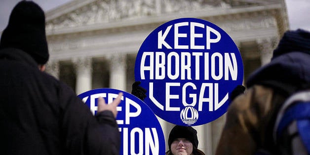WASHINGTON, UNITED STATES: Pro-choice supporter and intern with the National Organization for Women, Meredith Harper, smiles