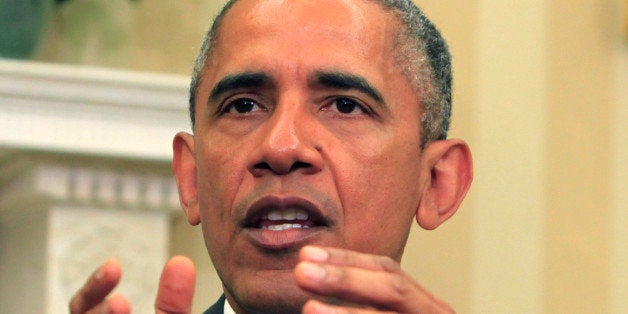 WASHINGTON, DC - MAY 22: U.S. President Barack Obama speaks while meeting with NATO Secretary-General Jens Stoltenberg in the Oval Office of the White House on May 26,2015 in Washington, DC. Obama said the United States is working closely with NATO in the fight against ISIL . (Photo by Dennis Brack-Pool/Getty Images)