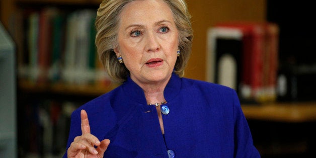 In this May 5, 2015, photo, Democratic presidential candidate Hillary Rodham Clinton speaks on immigration at an event at Rancho High School in Las Vegas. To judge them solely by their travels over the past month, you might think Jeb Bush has already plunged into the general election and Clinton has a serious fight on her hands for the Democratic nomination. (AP Photo/John Locher)