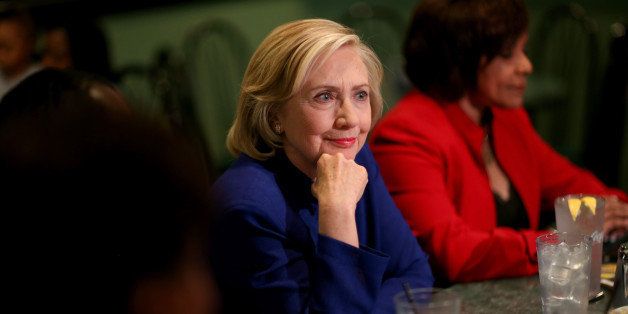 COLUMBIA, SC - MAY 27: Democratic Presidential Candidate Hillary Clinton sits in on a round table discussion as she visits the Kikis Chicken and Waffles restaurant on May 27, 2015 in Columbia, South Carolina. Hillary Clinton continues to campaign throughout the country for the Democratic nomination. (Photo by Joe Raedle/Getty Images)