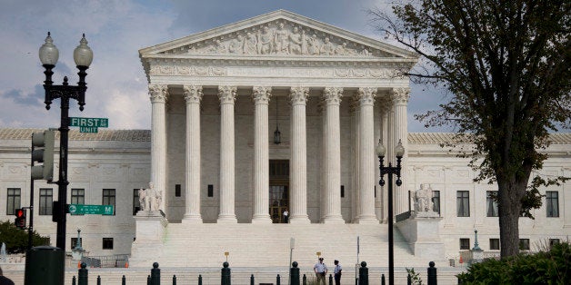 FILE - The Supreme Court Building is shown in this, Thursday, Sept. 18, 2014 file photo in Washington. President Barack Obamaâs health care overhaul has survived a barrage of Republican-led repeal votes and, barely, a Supreme Court challenge to its constitutionality. Now itâs back before the high court facing another line of attack. If Obama loses, many Americans could end up without insurance. The court will examine whether millions of people can continue to receive subsidies that are crucial to the programâs goal of providing universal coverage. (AP Photo/Carolyn Kaster, File)