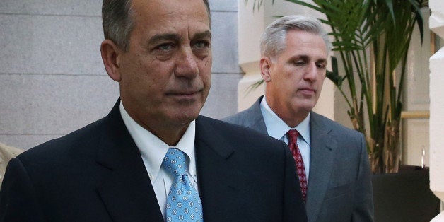 WASHINGTON, DC - OCTOBER 15: House Speaker John Boehner (R-OH) (L) and House Majority Whip Kevin McCarthy (R-CA) walk to a Re