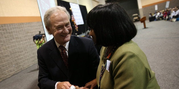 COLUMBIA, SC - APRIL 25: Potential Democratic presidential candidate former Sen. Lincoln Chafee (D-RI) greets a member of the audience after speaking at the South Carolina Democratic Party state convention April 25, 2015 in Columbia, South Carolina. Chafee joined former Maryland Gov. Martin O'Malley and Sen. Bernie Sanders (I-VT) in speaking to the convention. (Photo by Win McNamee/Getty Images)