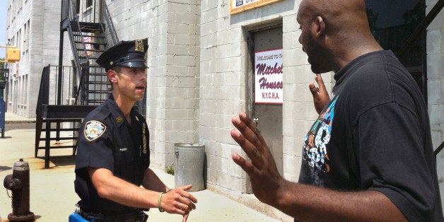 FILE - In this Wednesday, June 20, 2012 file photo, Det. Anthony Mannuzza, left, and Police Officer Robert Martin, right, simulate a street stop during a training session at the New York Police Department's training facility in Rodman's Neck, in the Queens borough of New York, as the NYPD was re-training thousands of officers on how to do street stops amid a wave of criticism about the departmentâs controversial stop, question and frisk policy. In the ongoing federal trial over stop and frisk, lawyers for men who have sued police are seeking to show a disproportionate number of black and Hispanic men are being wrongly stopped in part because officers are under too much pressure to keep enforcement numbers up. (AP Photo/Colleen Long, File)