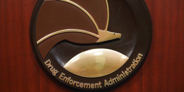 The seal of the Drug Enforcement Administration is seen on a lectern before the start of a press conference at DEA Headquarters on June 26, 2013 in Arlington, Virginia. AFP PHOTO/Mandel NGAN (Photo credit should read MANDEL NGAN/AFP/Getty Images)