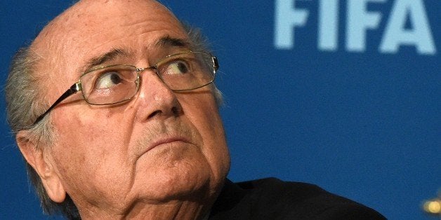 FIFA president Sepp Blatter looks on during a press conference on December 19, 2014 in the Moroccan city of Marrakesh top US