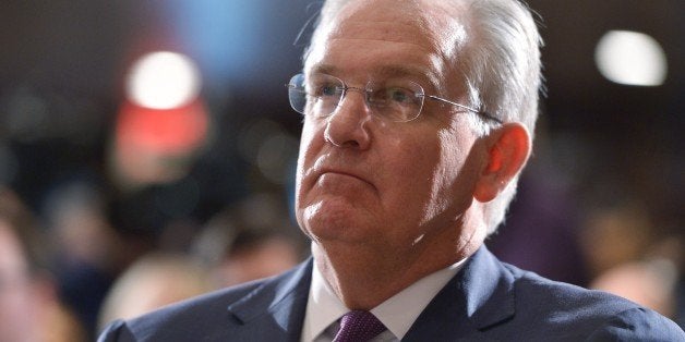 Missouri Governor Jay Nixon listens to a speaker during the launch of the US Agriculture Coalition for Cuba at the National Press Club on January 8, 2014 in Washington, DC. The coalition is seeking to advance trade relations between the US and Cuba by ending the embargo policy. AFP PHOTO/Mandel NGAN (Photo credit should read MANDEL NGAN/AFP/Getty Images)