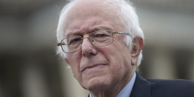 US presidential candidate Senator Bernie Sanders (I-VT) listens to speakers during an event on the Trans Pacific Partnership on Capitol Hill June 3, 2015 in Washington, DC. AFP PHOTO/BRENDAN SMIALOWSKI (Photo credit should read BRENDAN SMIALOWSKI/AFP/Getty Images)