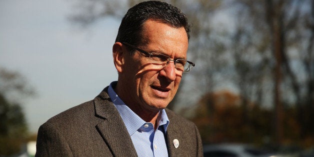 BRIDGEPORT, CT - NOVEMBER 04: Democratic Connecticut Governor Dan Malloy stops at a polling station on November 4, 2014 in Bridgeport, Connecticut. Around the country voters are turning out to decide the 2014 midterm elections. In Connecticut voters will decide on whether to keep Democratic Malloy who is currently in a dead heat with Republican Tom Foley. Polls show a tight race in many states with most analysts predicting that the Republicans are on track to make gains and possibly control the U.S. Senate. (Photo by Spencer Platt/Getty Images)