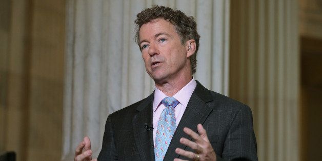 WASHINGTON, DC - JUNE 01: U.S. Sen. Rand Paul (R-KY) does a live interview with FOX News in the Russell Senate Office Building rotunda on Capitol Hill June 1, 2015 in Washington, DC. In protest of the National Security Agency's sweeping program to collect U.S. citizens' telephone metadata, Paul blocked an extension of some parts of the USA PATRIOT Act, allowing them to lapse at 12:01 a.m. Monday. The Senate will continue to work to restore the lapsed authorities by amending a House version of the bill and getting it to President Obama later this week. (Photo by Chip Somodevilla/Getty Images)