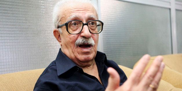 FILE - FILE - In this Sept. 5, 2010 file photo, Tariq Aziz, Saddam Hussein's long time foreign minister, speaks to the Associated Press in Baghdad, Iraq. Officials say Aziz has died in a hospital in southern Iraq on Friday, June 5, 2015. (AP Photo/Hadi Mizban, File)
