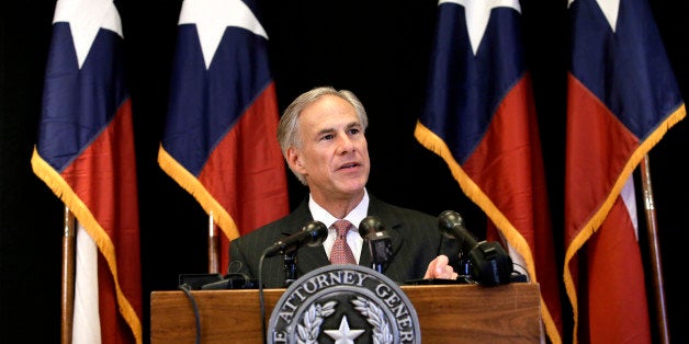 Texas Attorney General Greg Abbott makes a statement during a news conference, Monday, Nov. 4, 2013, in Dallas. Abbott announced his office is suing the federal Equal Employment Opportunity Commission over what he says is âbullyingâ of Texas companies over the hiring of felons. The lawsuit is the 30th filed by Abbottâs office against the administration of President Barack Obama. (AP Photo/Tony Gutierrez)