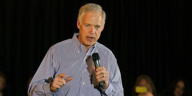 MILWAUKEE, WI - APRIL 01: U.S. Sen. Ron Johnson (R-WI) speaks during a pancake breakfast for Republican Presidential candidate, former Massachusetts Gov. Mitt Romney at Bluemound Gardens on April 1, 2012 in Milwaukee, Wisconsin. With less than a week before the Wisconsin primary, Mitt Romney continues to campaign through the state. (Photo by Justin Sullivan/Getty Images)