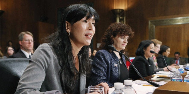 WASHINGTON, DC - MARCH 18: National Domestic Workers Alliance Director Ai-jen Poo, Tufts University Electrical and Computer Engineering Professor Karen Panetta, Asian American Justice Center President and CEO Mee Moua, Georgetown University International Migration Professor Susan Martin, National Council of La Raza's Health and Civil Rights Policy Project Director Jennifer Ng'andu testify before the Senate Judiciary Committee March 18, 2013 in Washington, DC. The committee heard testimony about immigration reform in regards to women and families during the hearing titled 'How Comprehensive Immigration Reform Should Address the Needs of Women and Families.' (Photo by Chip Somodevilla/Getty Images)