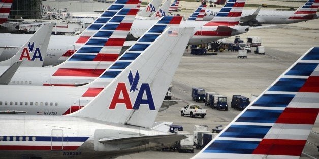 American Airlines passenger planes are seen on the tarmac at Miami International Airport in Miami, Florida, June 8, 2015. AFP PHOTO/ROBYN BECK (Photo credit should read ROBYN BECK/AFP/Getty Images)